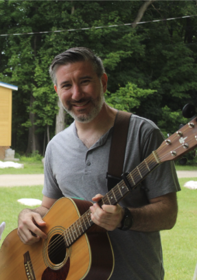 David Kogut playing guitar